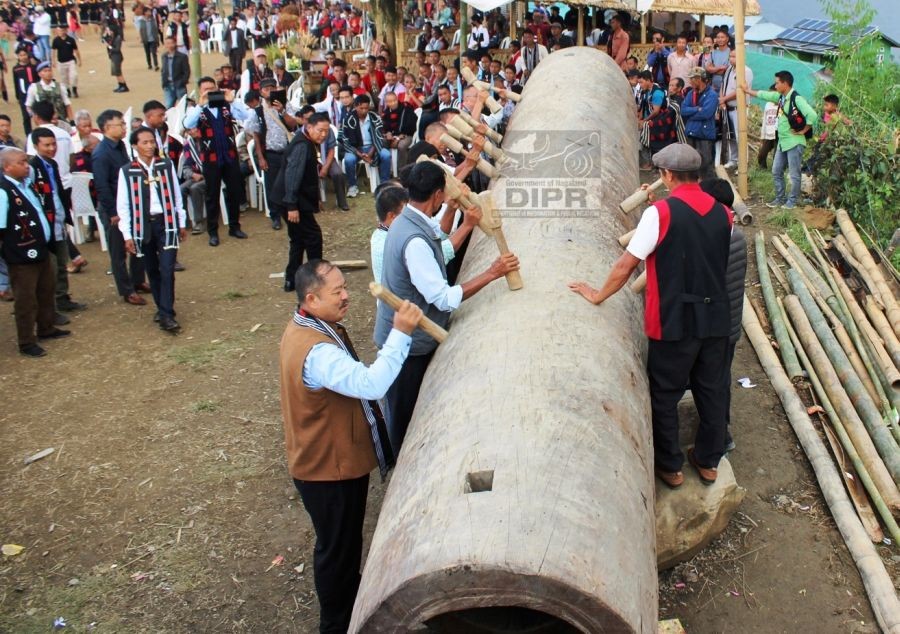 MLA and Chairperson, DPDB Noklak P Longon beating the log drum with Pangsha team during the Tsokum festival celebration at Noklak. The celebration was organised by TRPO at Noklak Village on October 5. (DIPR Photo)